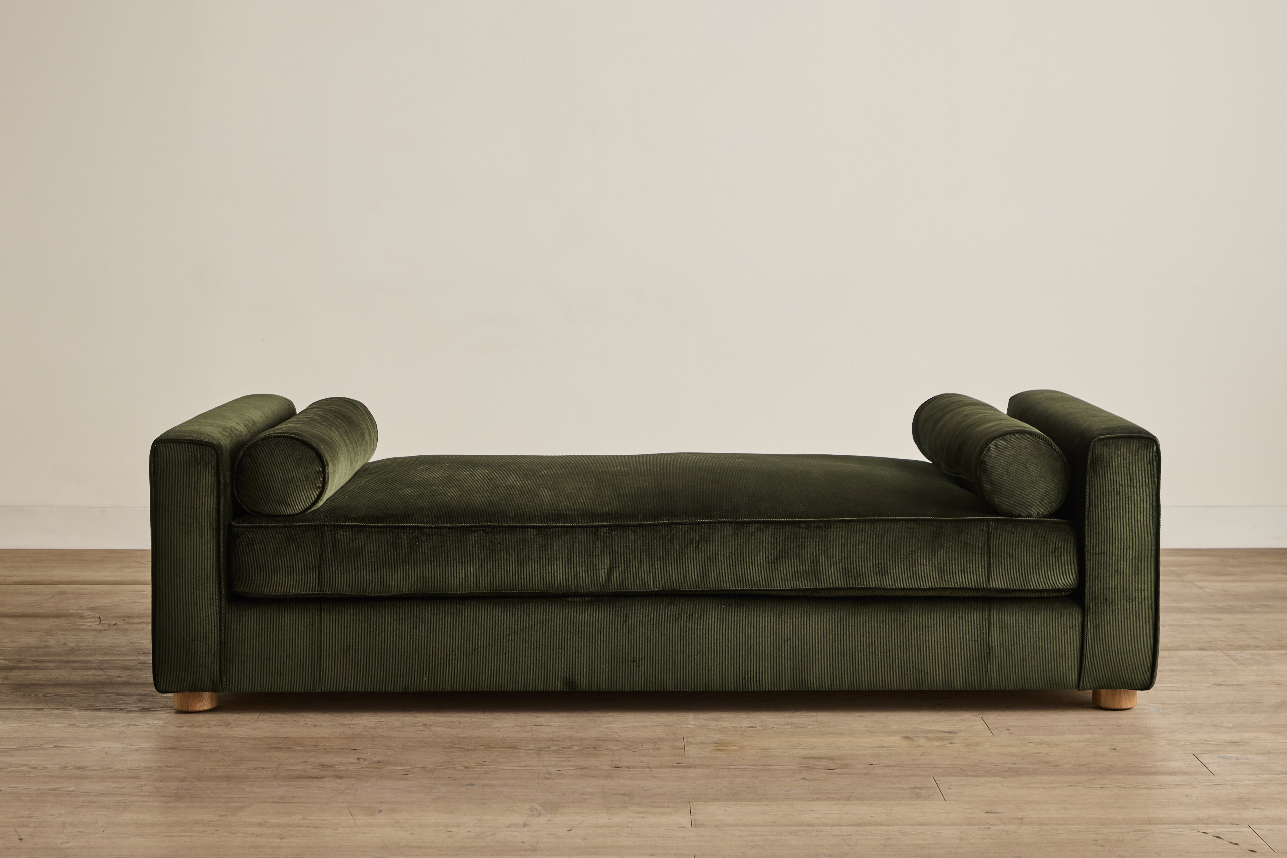 Shown in Holland & Sherry Dark Olive Corduroy and Natural Oak