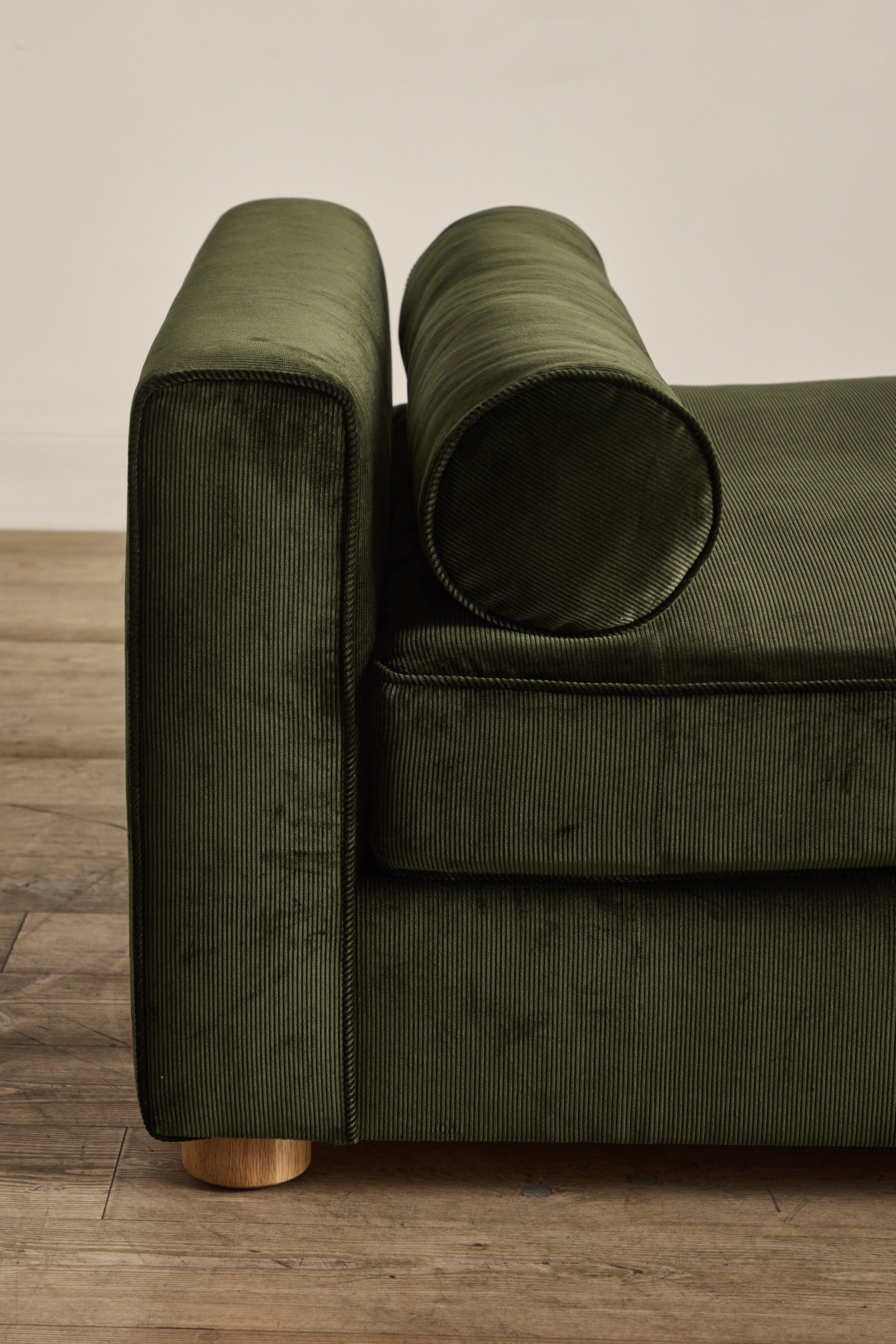 Shown in Holland & Sherry Dark Olive Corduroy and Natural Oak