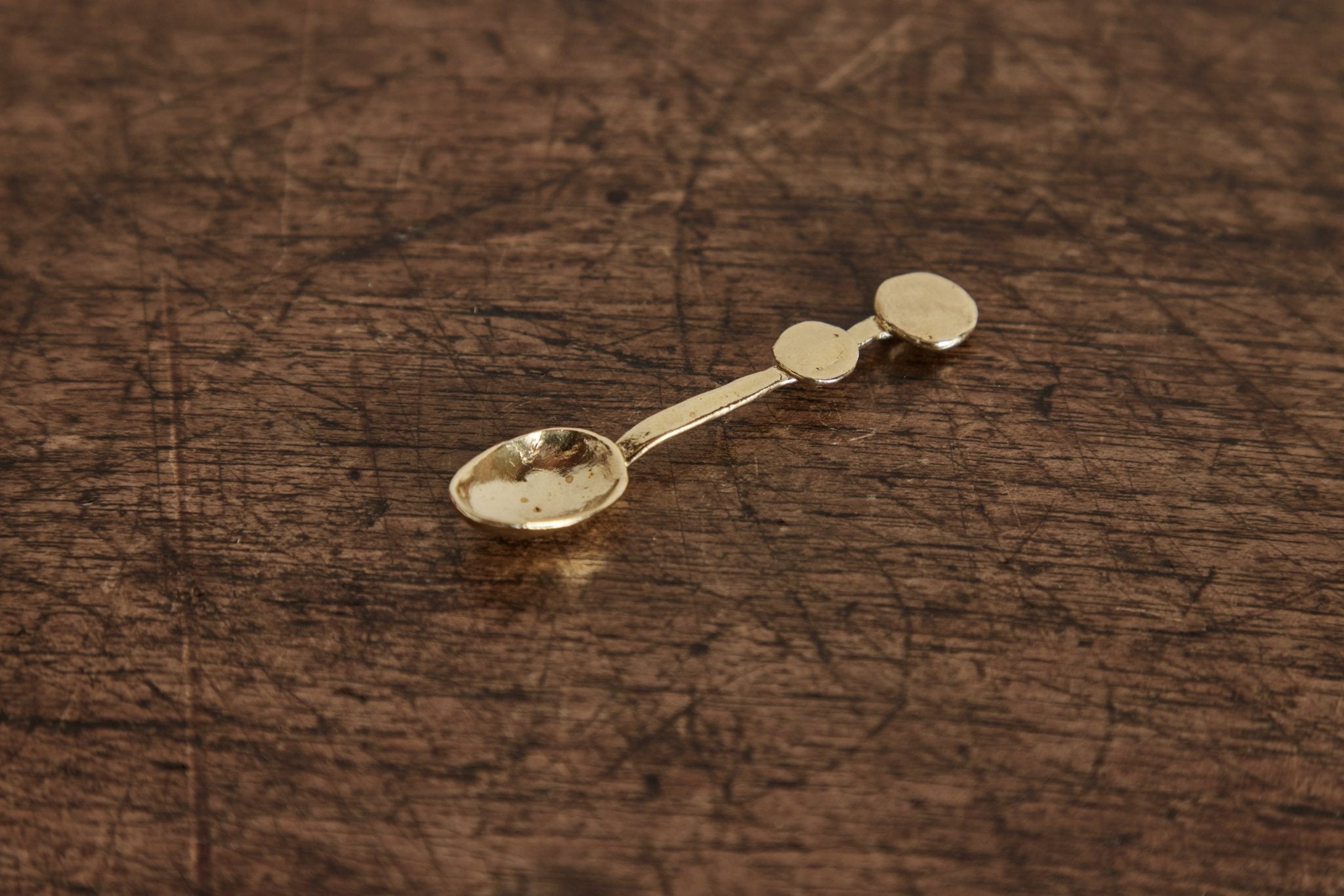 Unearthen, Brass Dotty Spoon - Nickey Kehoe