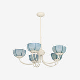 Shown in UECo. Signature Color Alabaster White painted finish with Shades in Customer's Own Material Paso in Pale Marine by John Boyd Textiles
