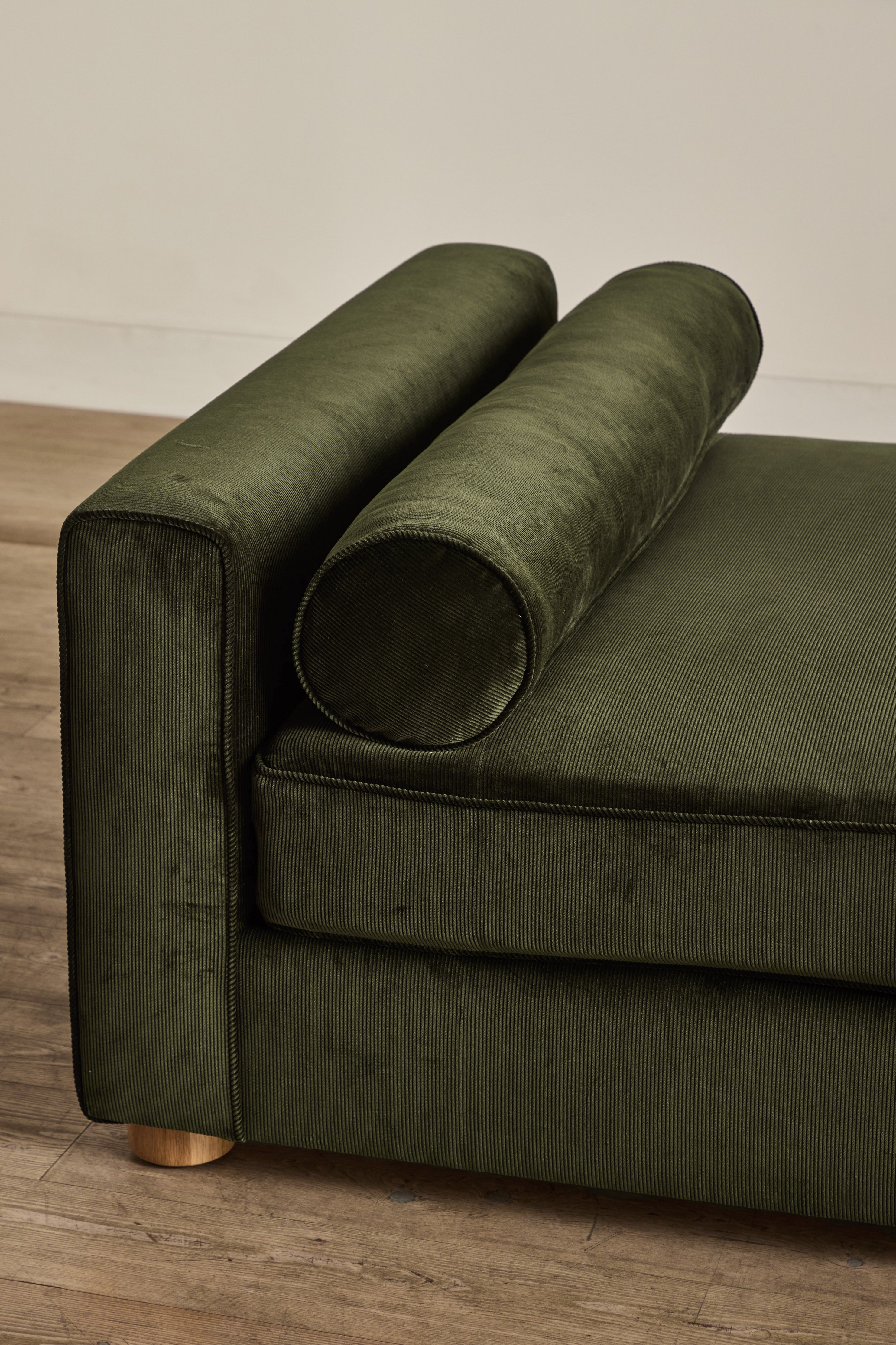 Shown in Holland & Sherry Dark Olive Corduroy and Natural Oak 