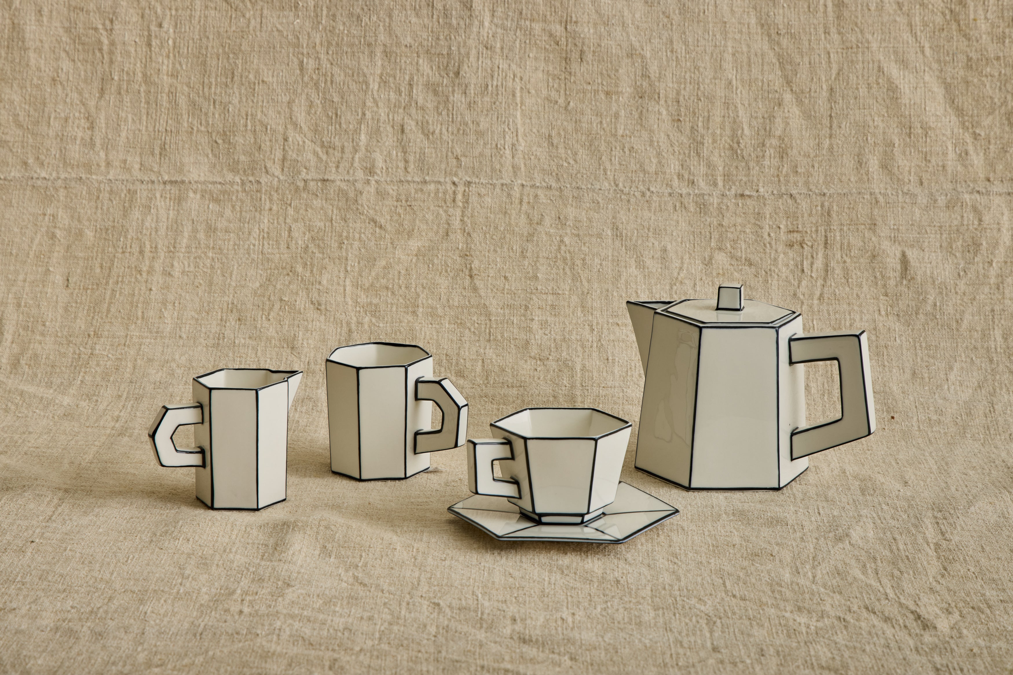 Shown with matching Tea Pot, Tea Cup, and Espresso Cup & Saucer
