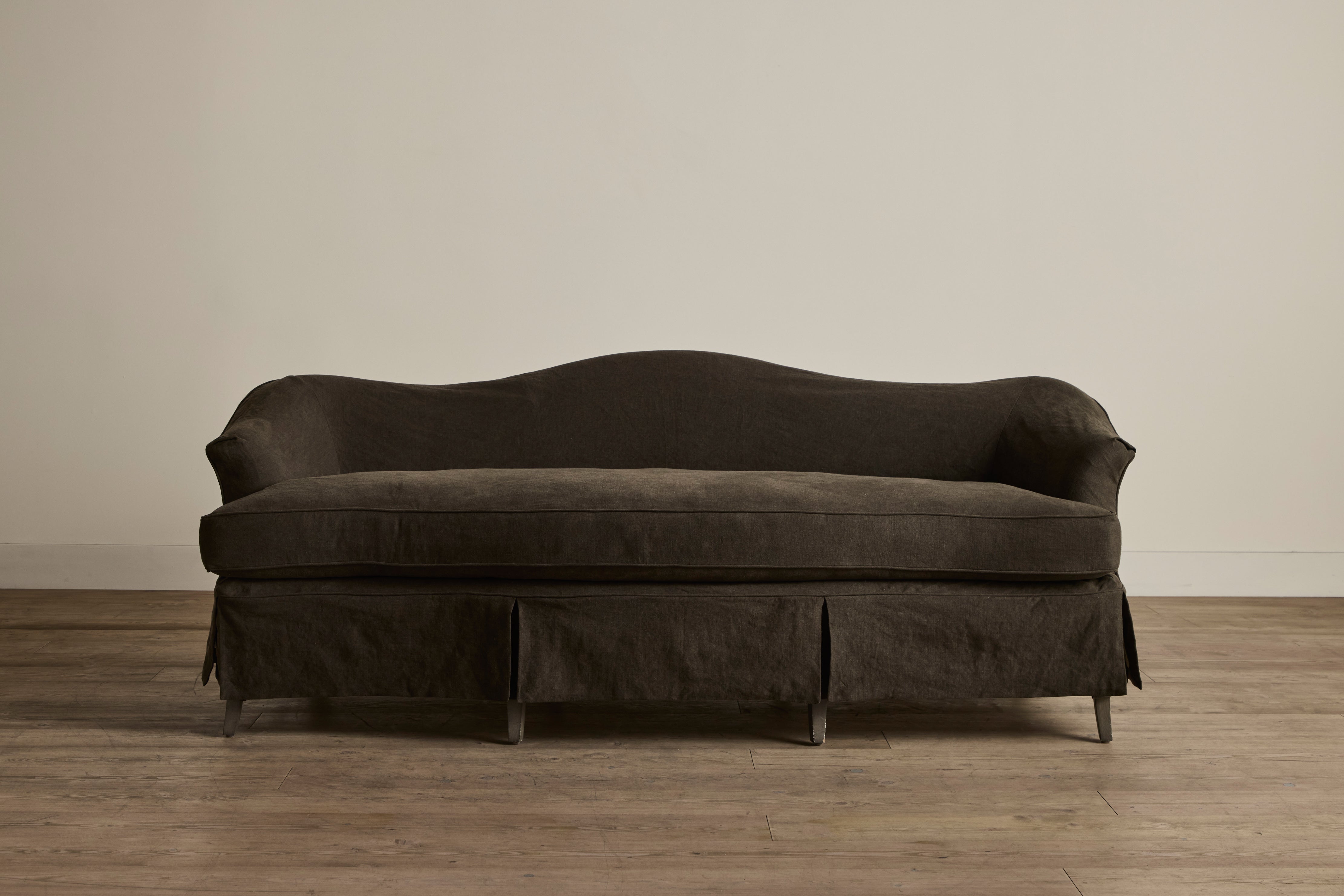 Shown in Libeco Cafe Noir Slipcover and Smoked Oak 