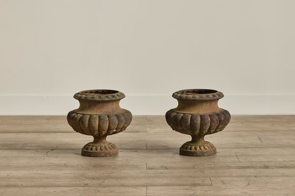Pair of Cast Iron Urns