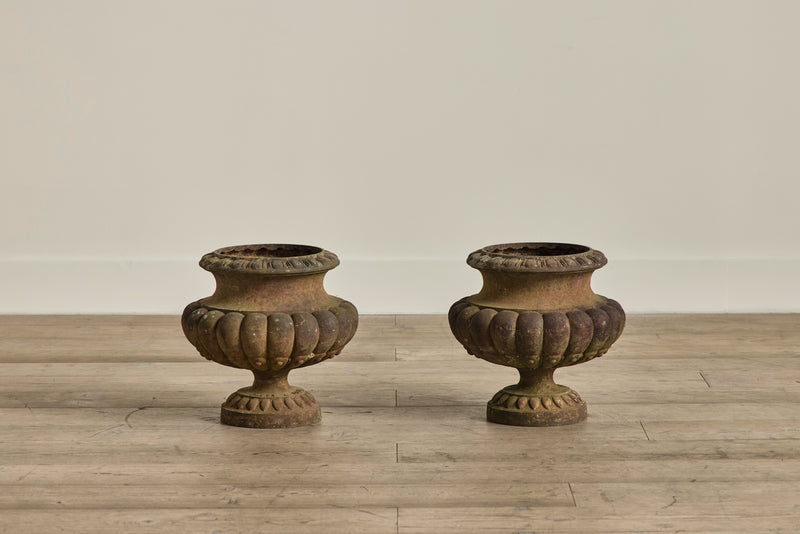 Pair of Cast Iron Urns