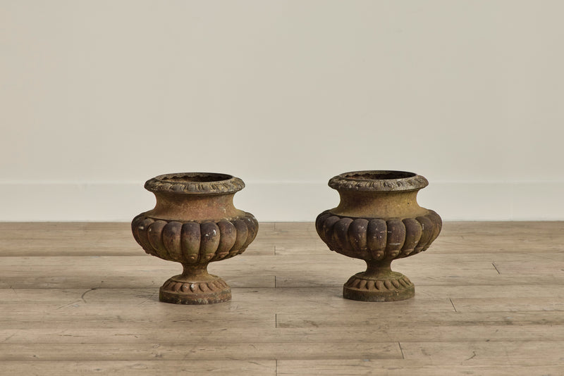 Pair of Cast Iron Urns