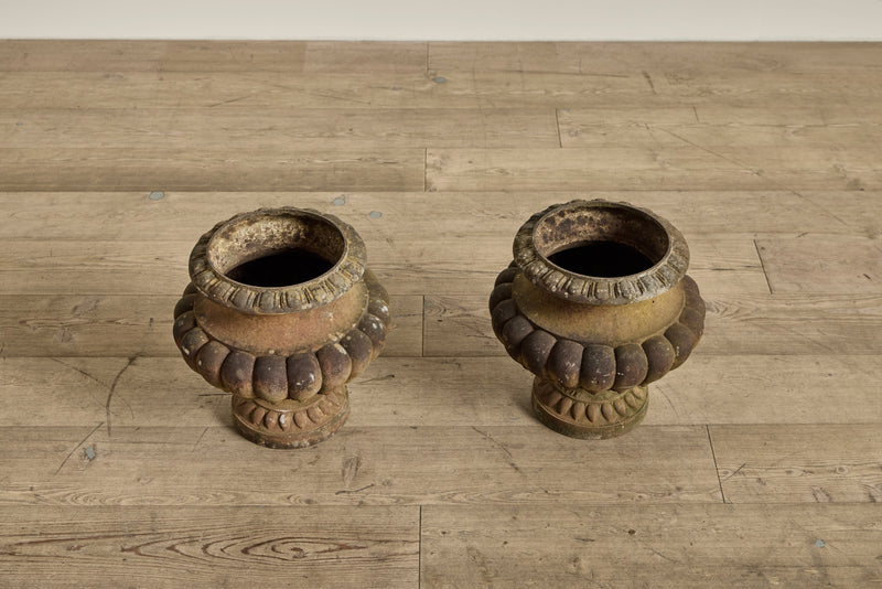 Pair of Cast Iron Urns