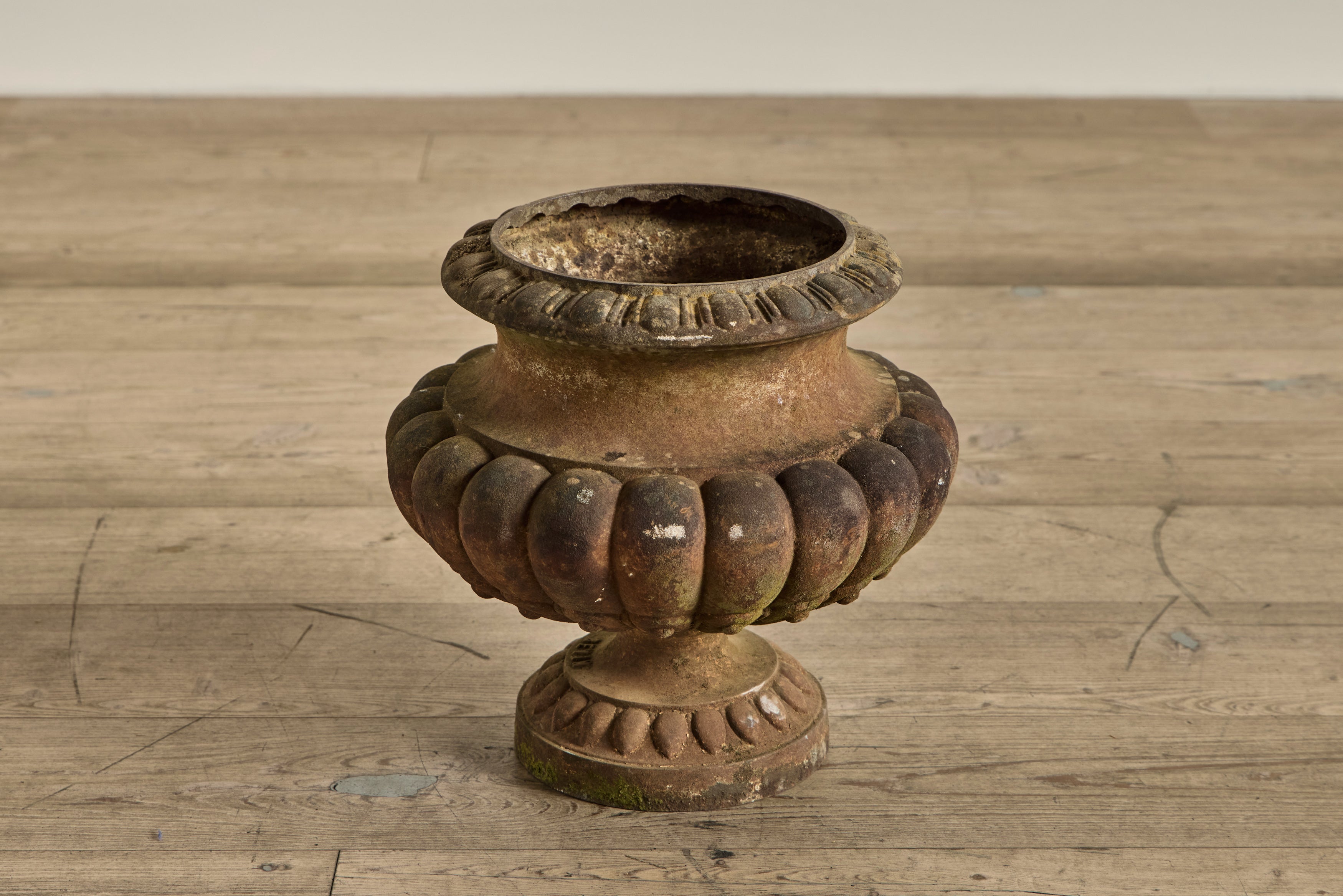 Pair of Cast Iron Urns