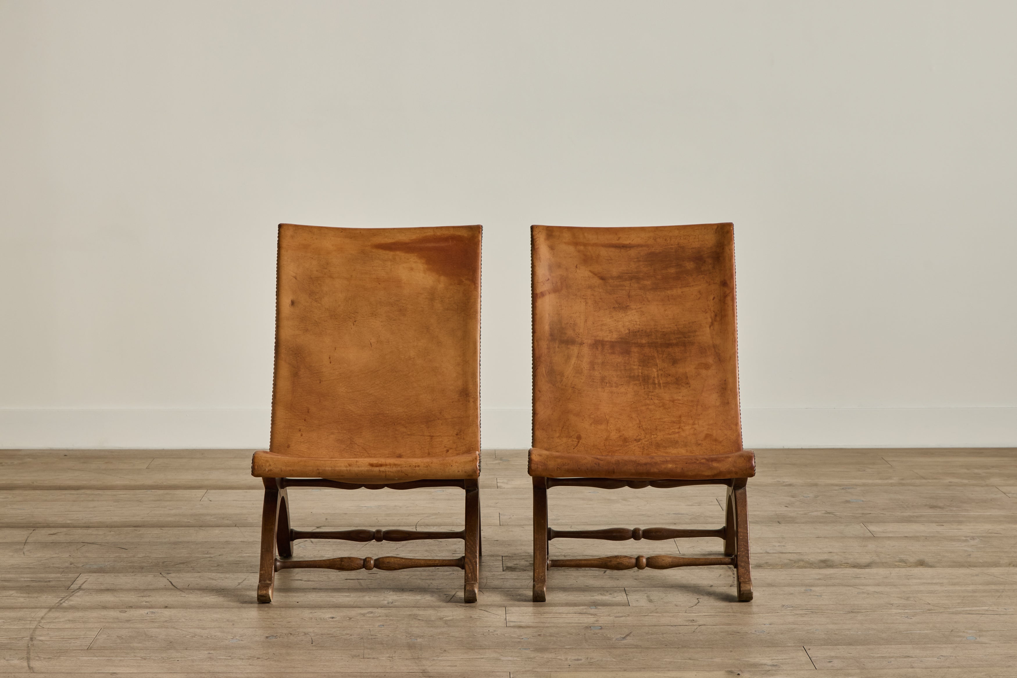 Pair of Spanish Leather Chairs