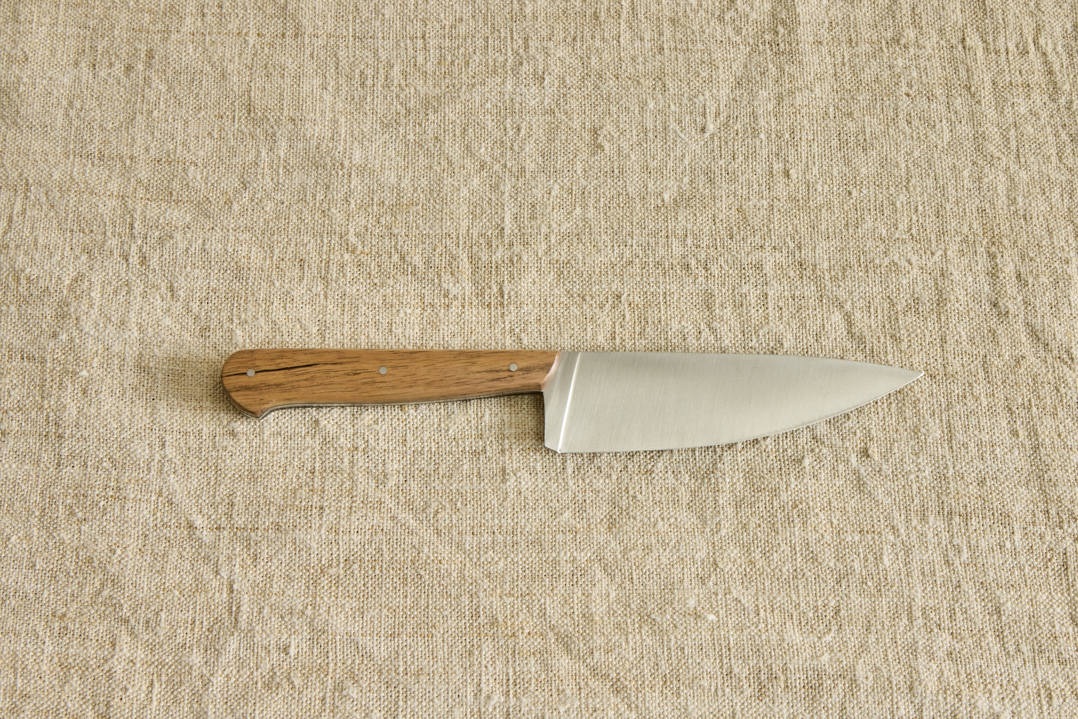 Shown in Ebony and Sapwood Handle