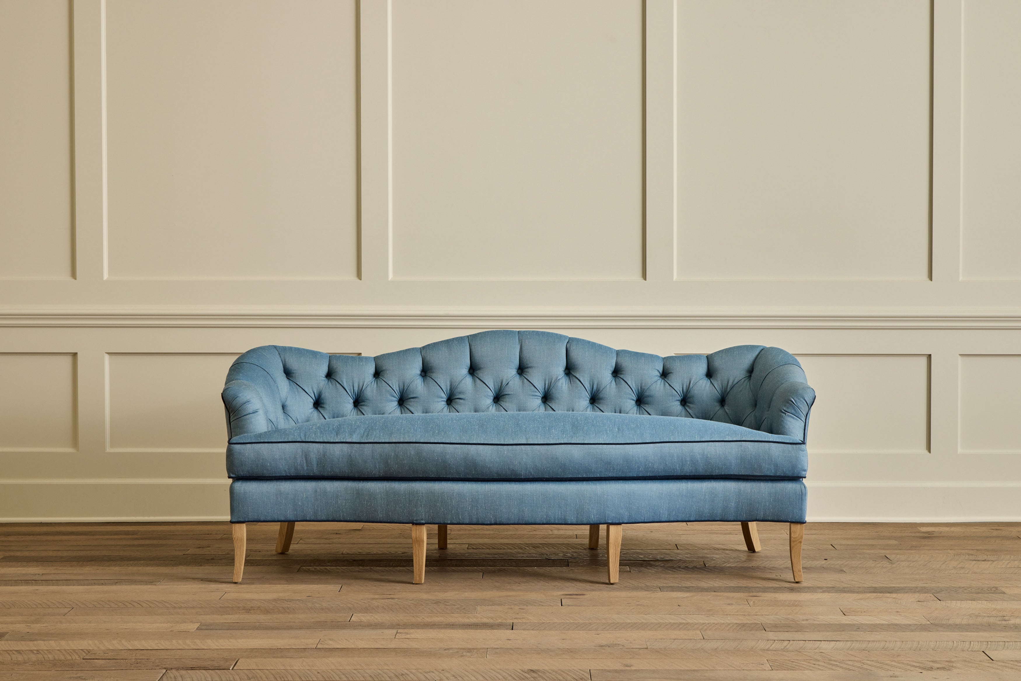 Tufted Camelback Sofa