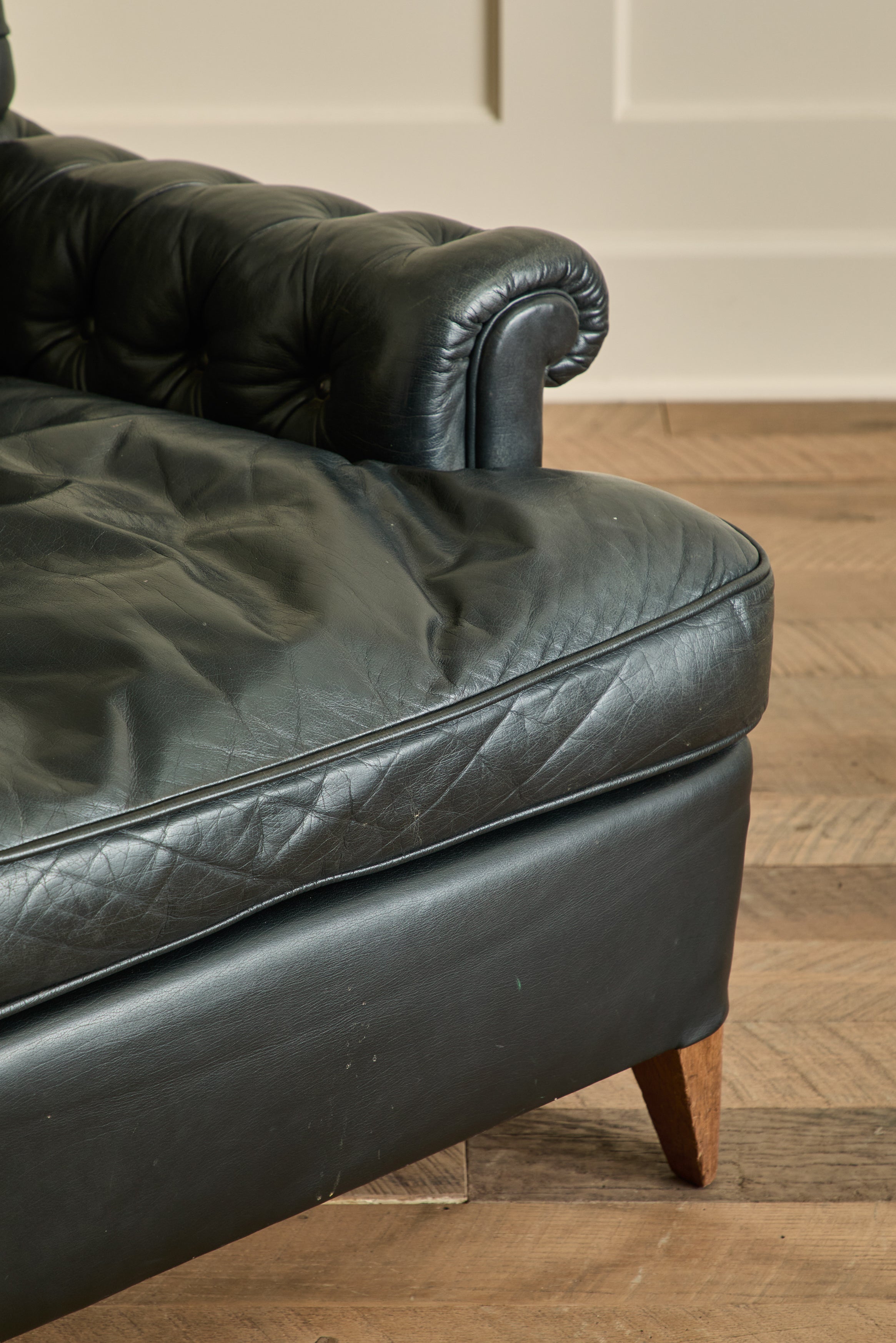 Pair of Tufted Black Leather Chairs