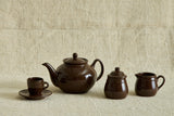Shown with matching Teapot, Creamer, and Sugar Bowl.