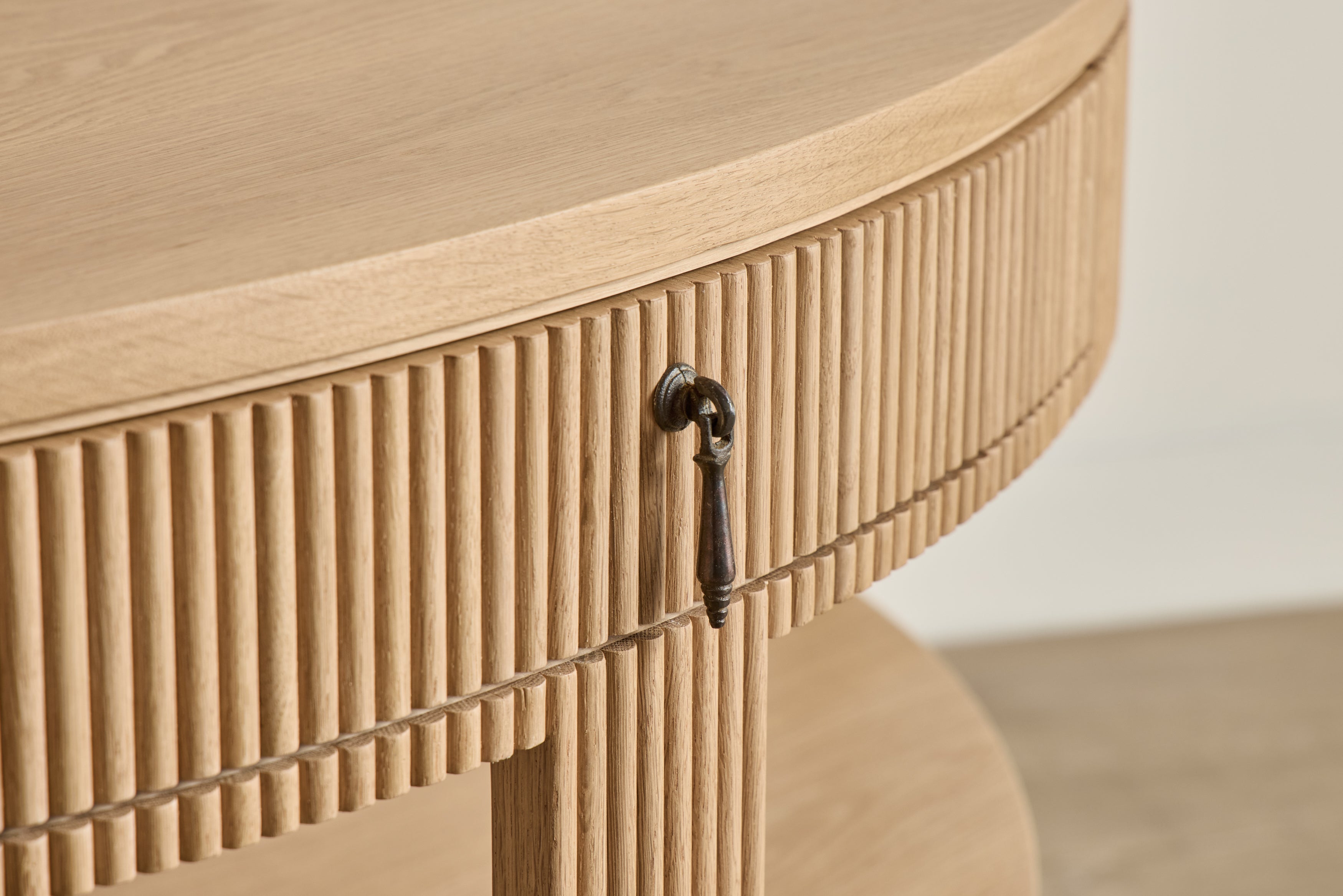 Top view of the wooden console table highlighting the semi-circular shape and smooth surface.