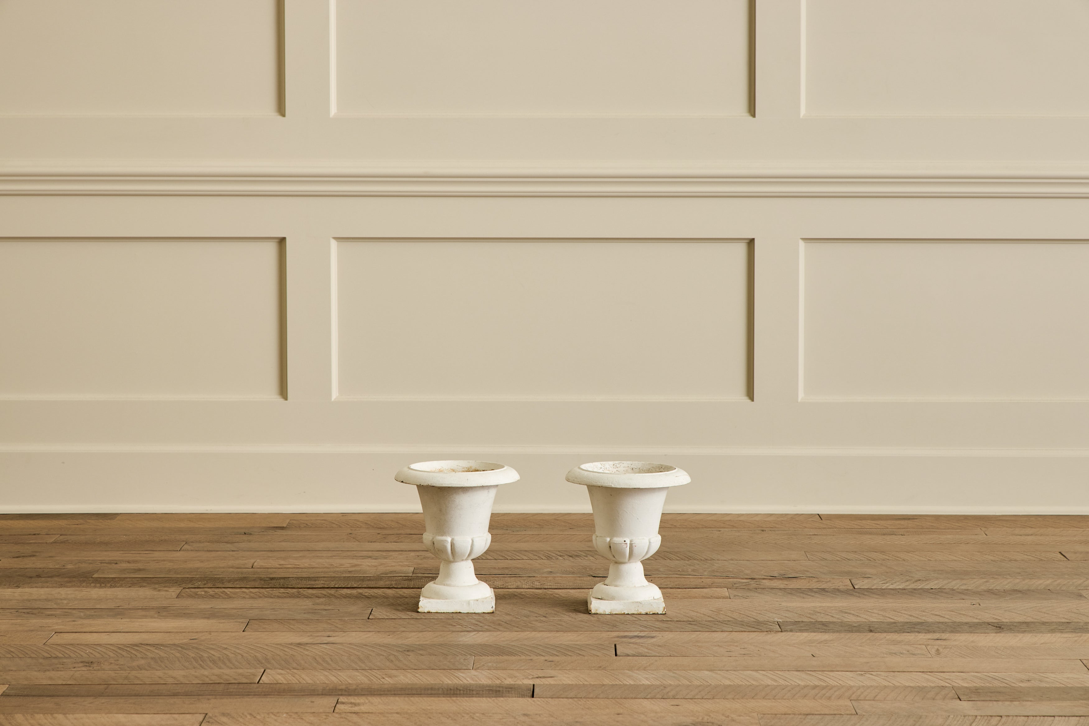 Pair of White Iron Garden Urns
