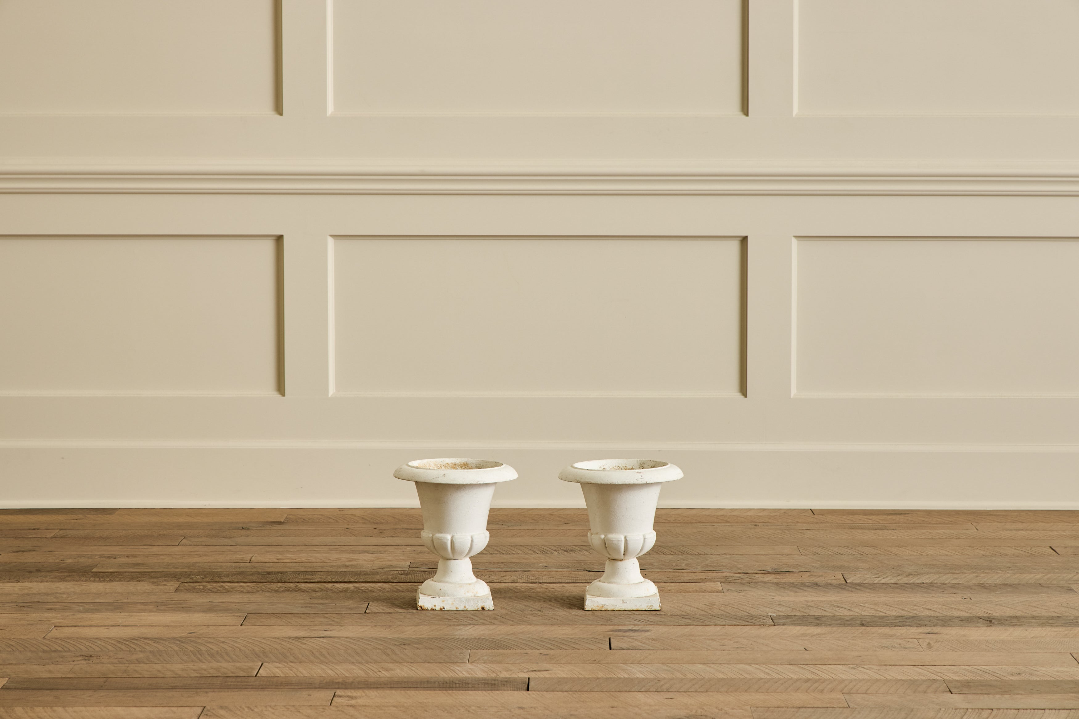 Pair of White Iron Garden Urns