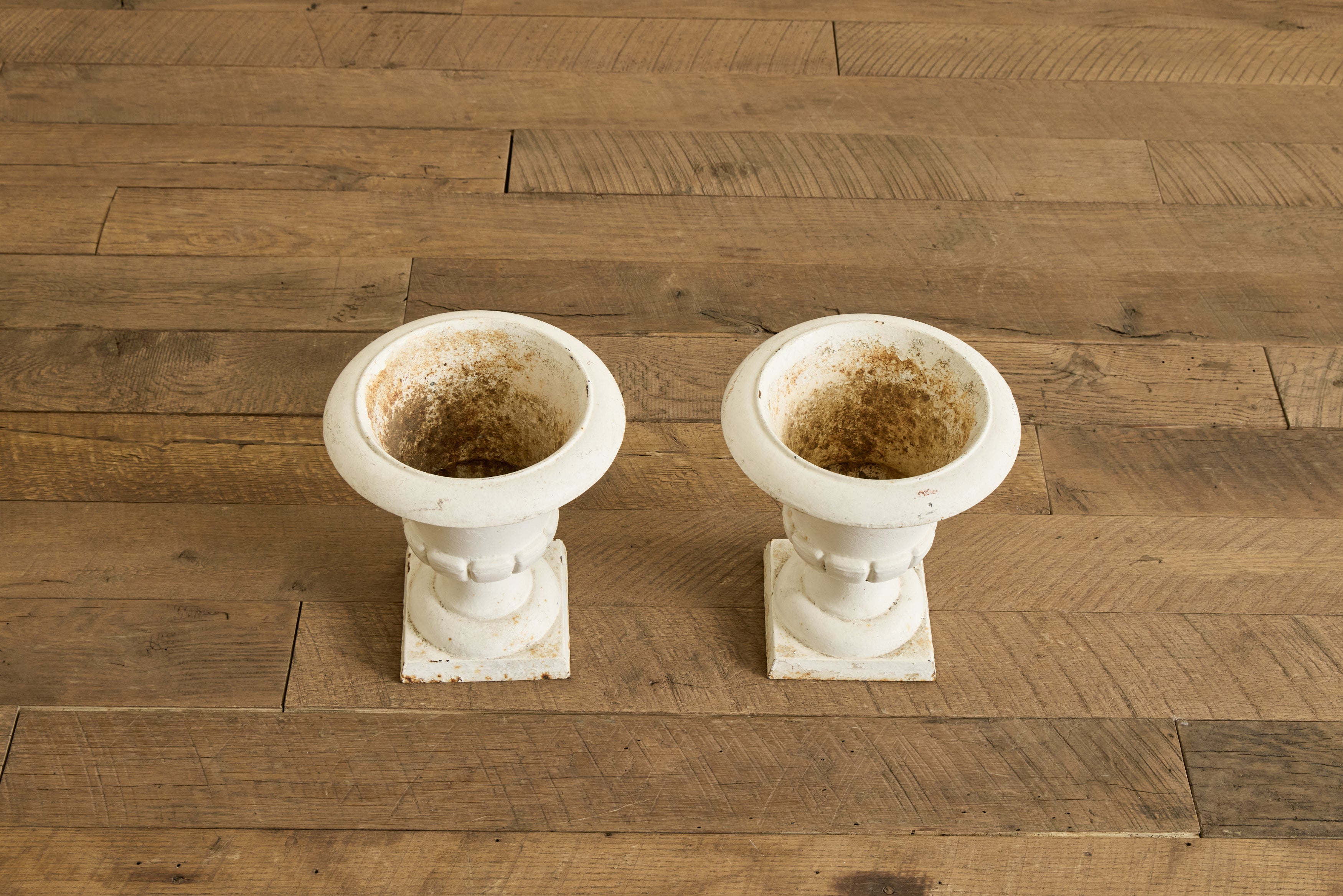 Pair of White Iron Garden Urns