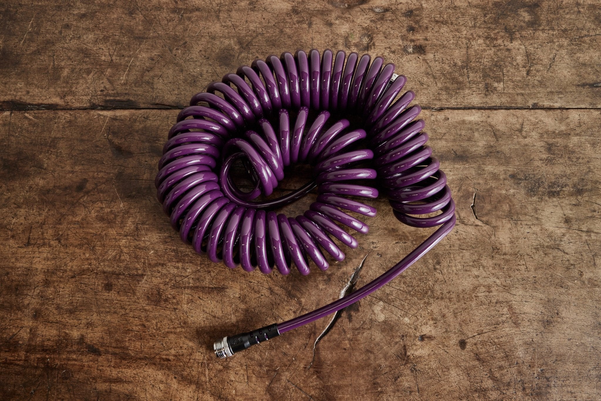 Coiled Garden Hose, 50' - Nickey Kehoe