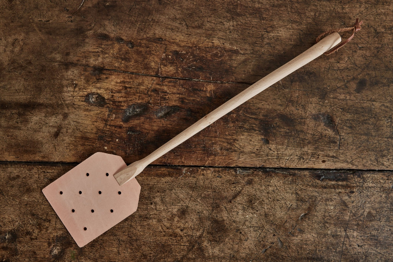 leather-and-wood-bug-swat-