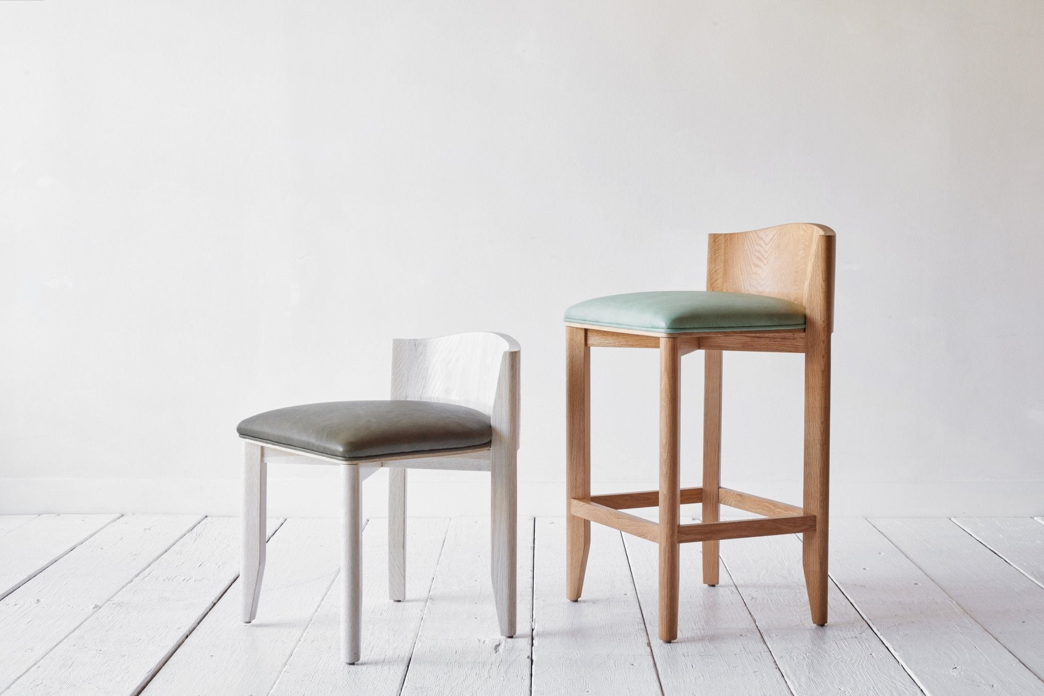 (L) NK Collection Vanity Stool Shown in Spruce Howe Maroc and Custom Finish; (R) NK Collection Counter Height Vanity Stool Shown in Howe Duck Egg Maroc and Natural Oak
