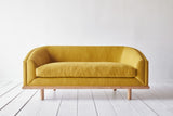 Shown in Customer's Own Material (James Malone Washed Ochre) and Natural Oak, 72 in.