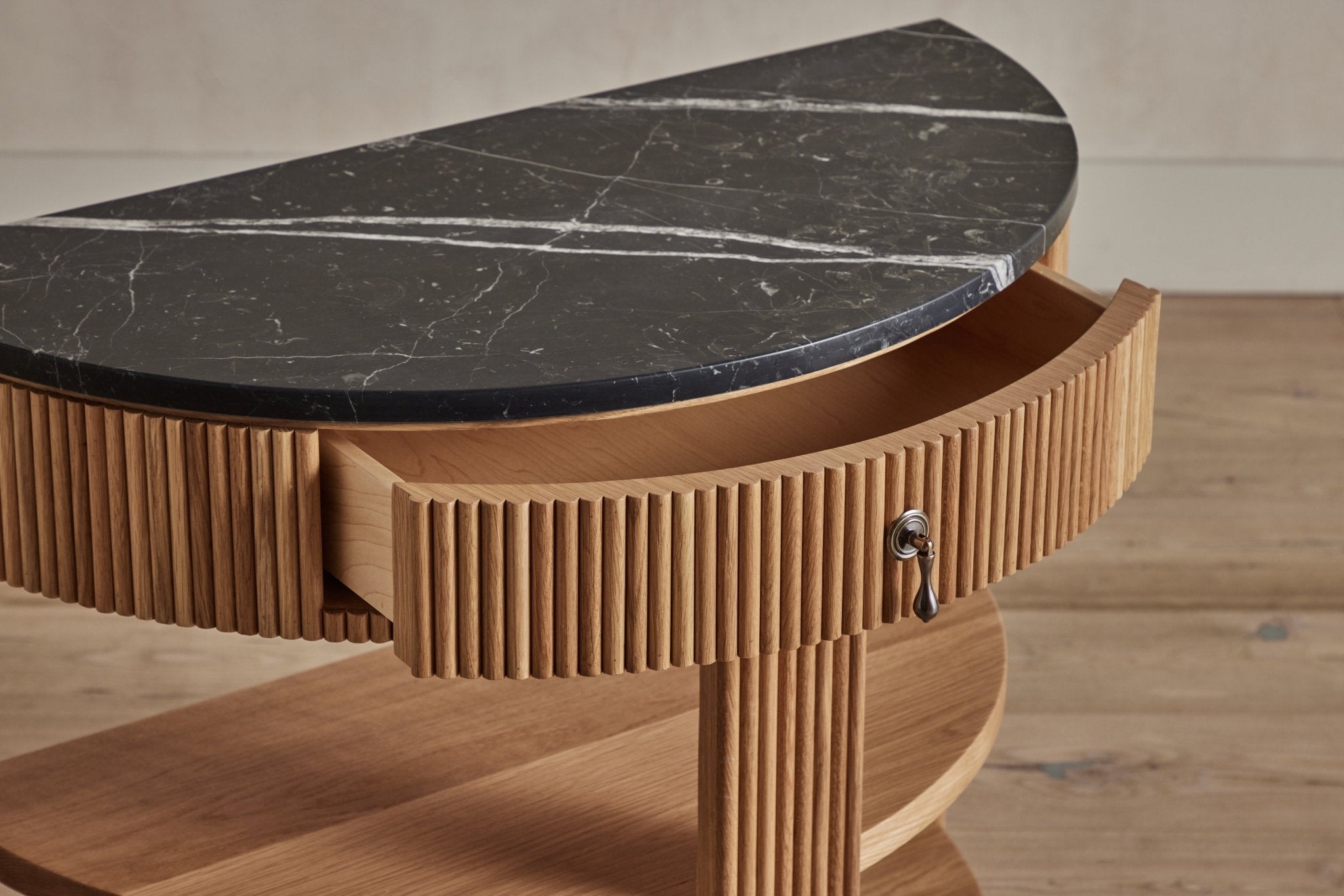 Shown in Natural Oak with Marble Top