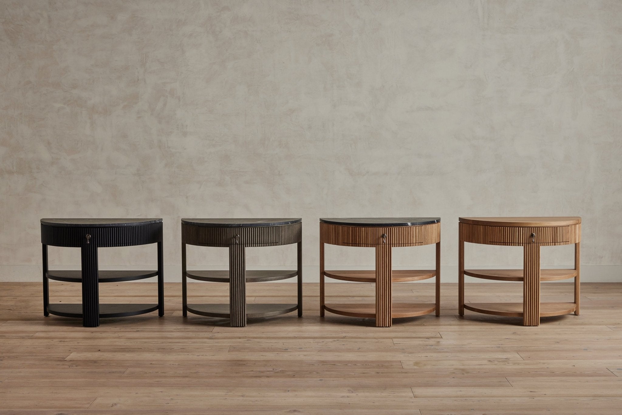 Shown in Ebony, Smoked and Natural Oak with Negro Marquina; Natural Oak with wood top