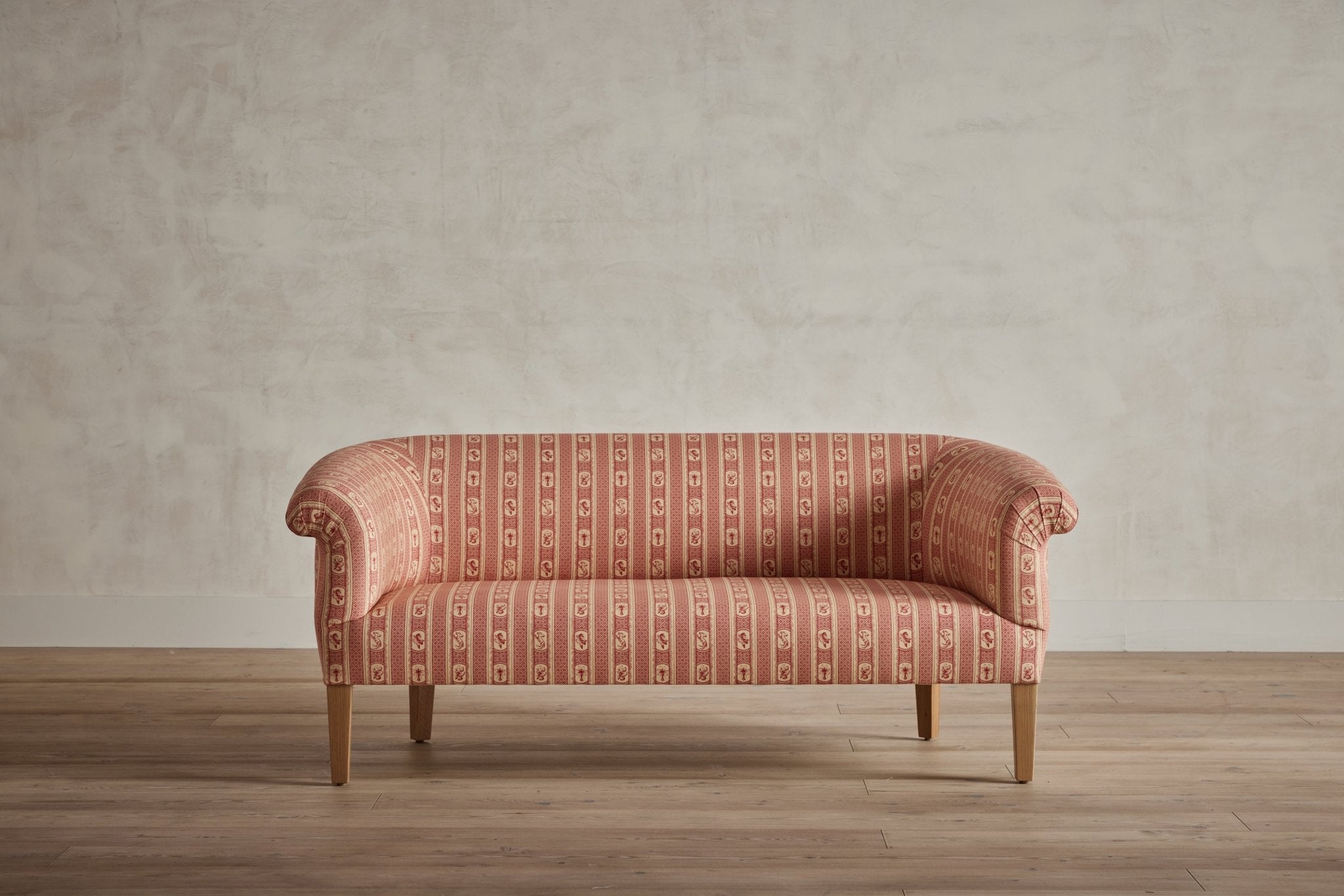 Shown in Customer’s Own Material (Pierre Frey, Marquis de Pierre Rayure in Rouge) and Natural Oak, 62 In.