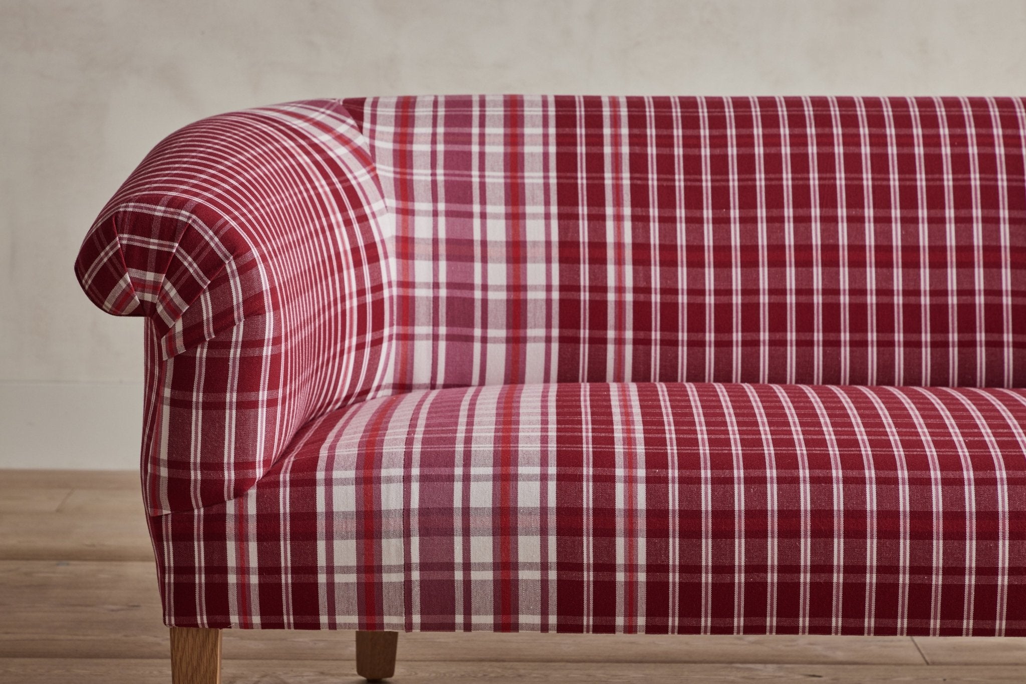 Shown in Customer’s Own Material (Italian Burgundy Plaid) and Natural Oak