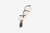 Shown in Antique Brass with White Linen Shades