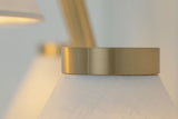 Shown in Hewn Brass Lacquered with Shade