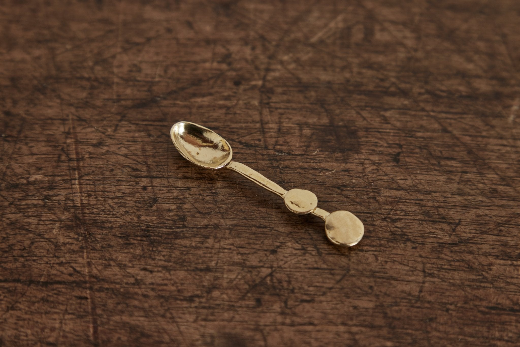 Unearthen, Brass Dotty Spoon - Nickey Kehoe