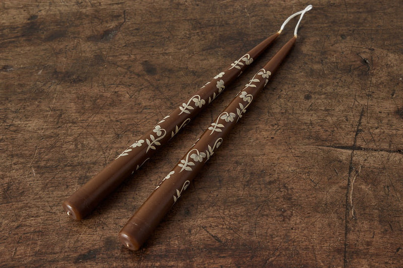 Brown Tapers with White Flowers