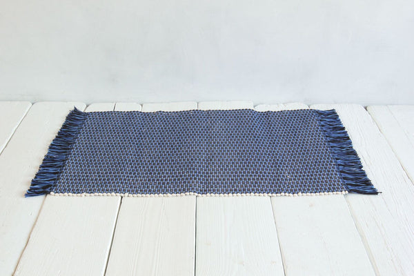 One Oxford Hand Loomed Rug.