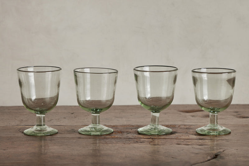 Vintage Brass Wine Goblets, Thailand Handmade Drinking Glasses Stemmed Tall  on white background. Stock Photo