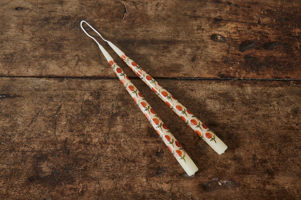 Cream Tapers With Orange Flowers